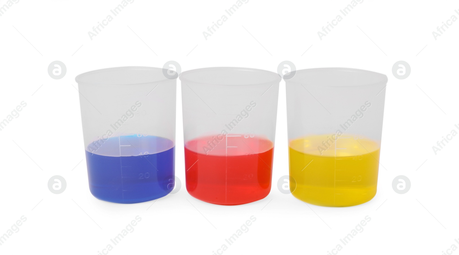 Photo of Beakers with colorful liquids isolated on white. Kids chemical experiment set