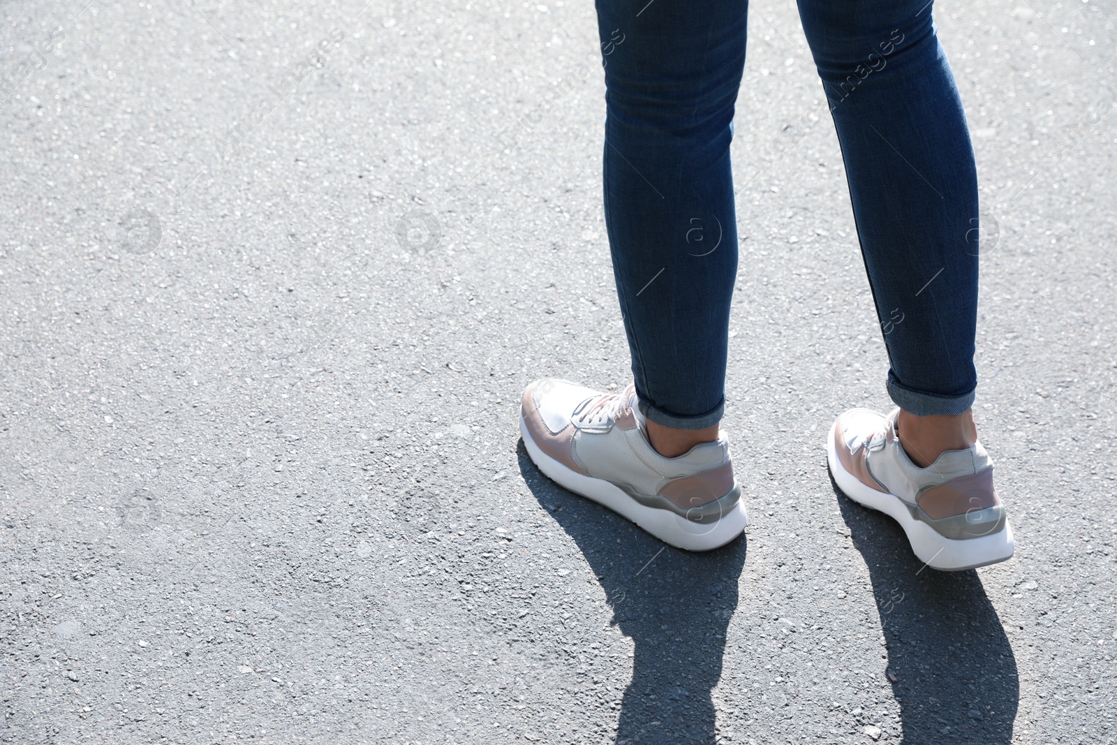 Photo of Woman walking outdoors, closeup with space for text. Choosing way concept.