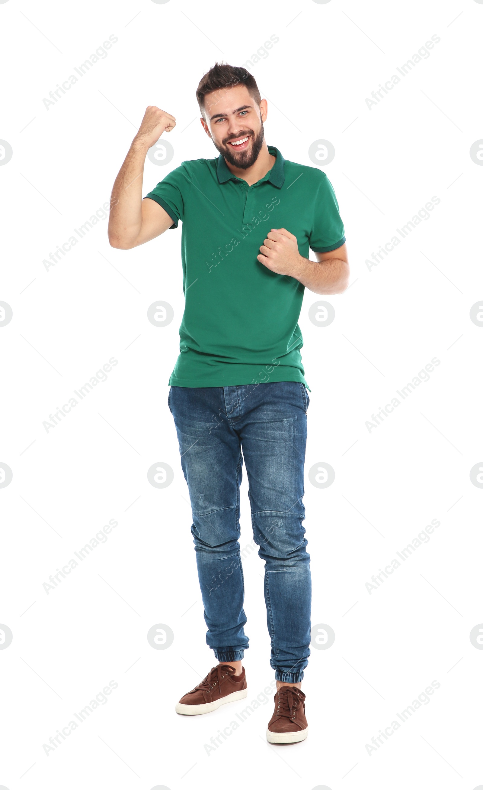 Photo of Happy young man celebrating victory on white background