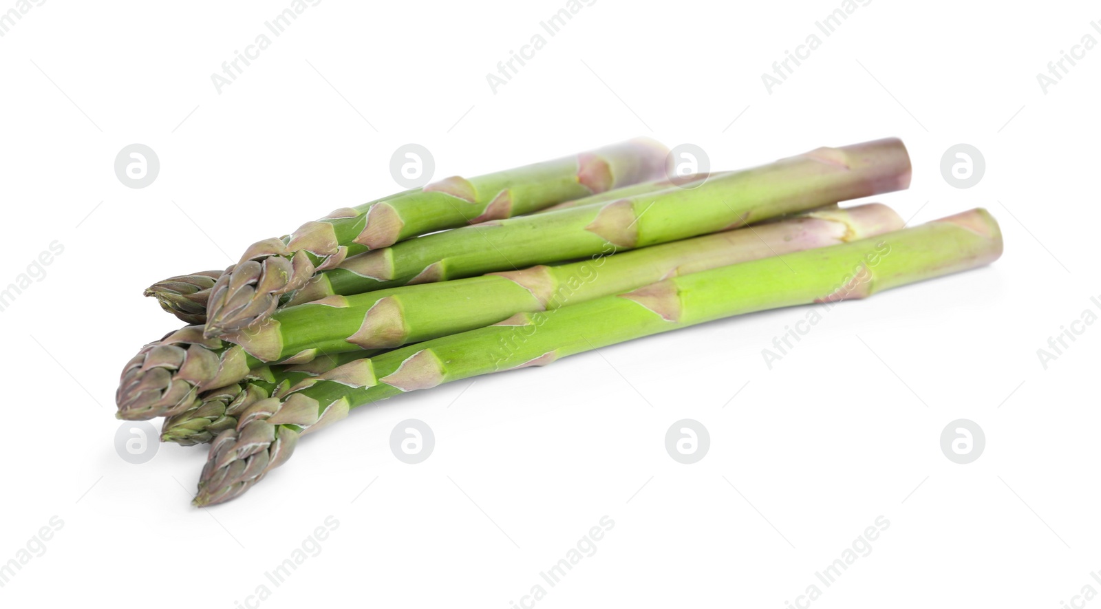 Photo of Fresh raw asparagus isolated on white. Healthy eating