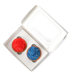 Photo of Box with delicious cupcakes on white background, top view