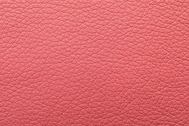 Texture of pink leather as background, closeup