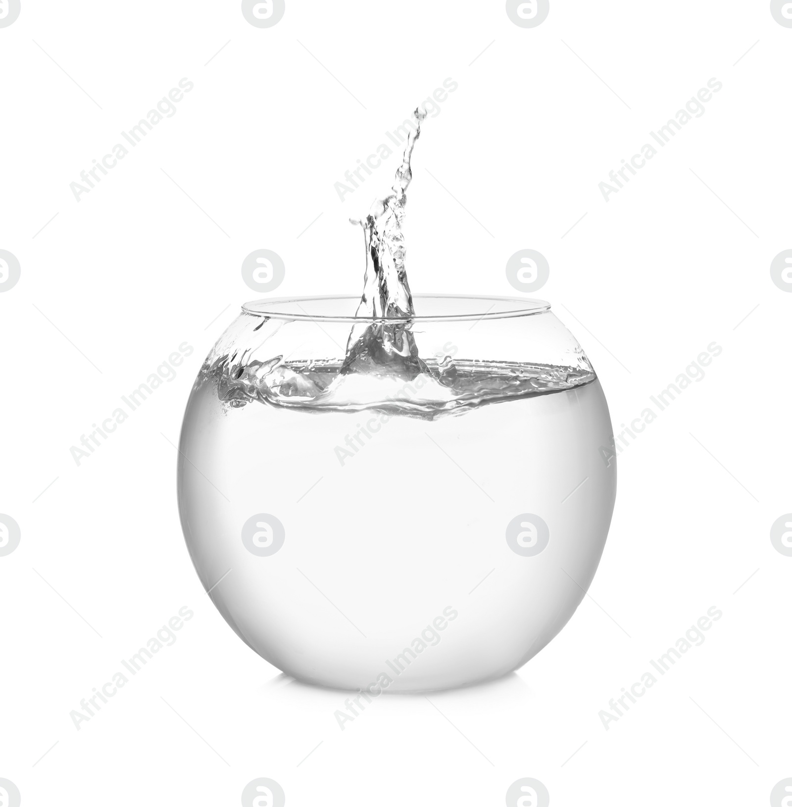 Photo of Splash of water in round fish bowl on white background