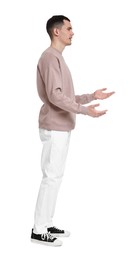 Photo of Handsome young man greeting someone on white background