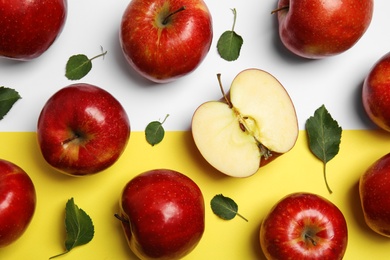 Photo of Flat lay composition with ripe juicy red apples and leaves on color background