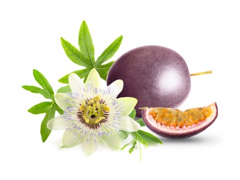 Delicious ripe passion fruits, flower and green leaves on white background