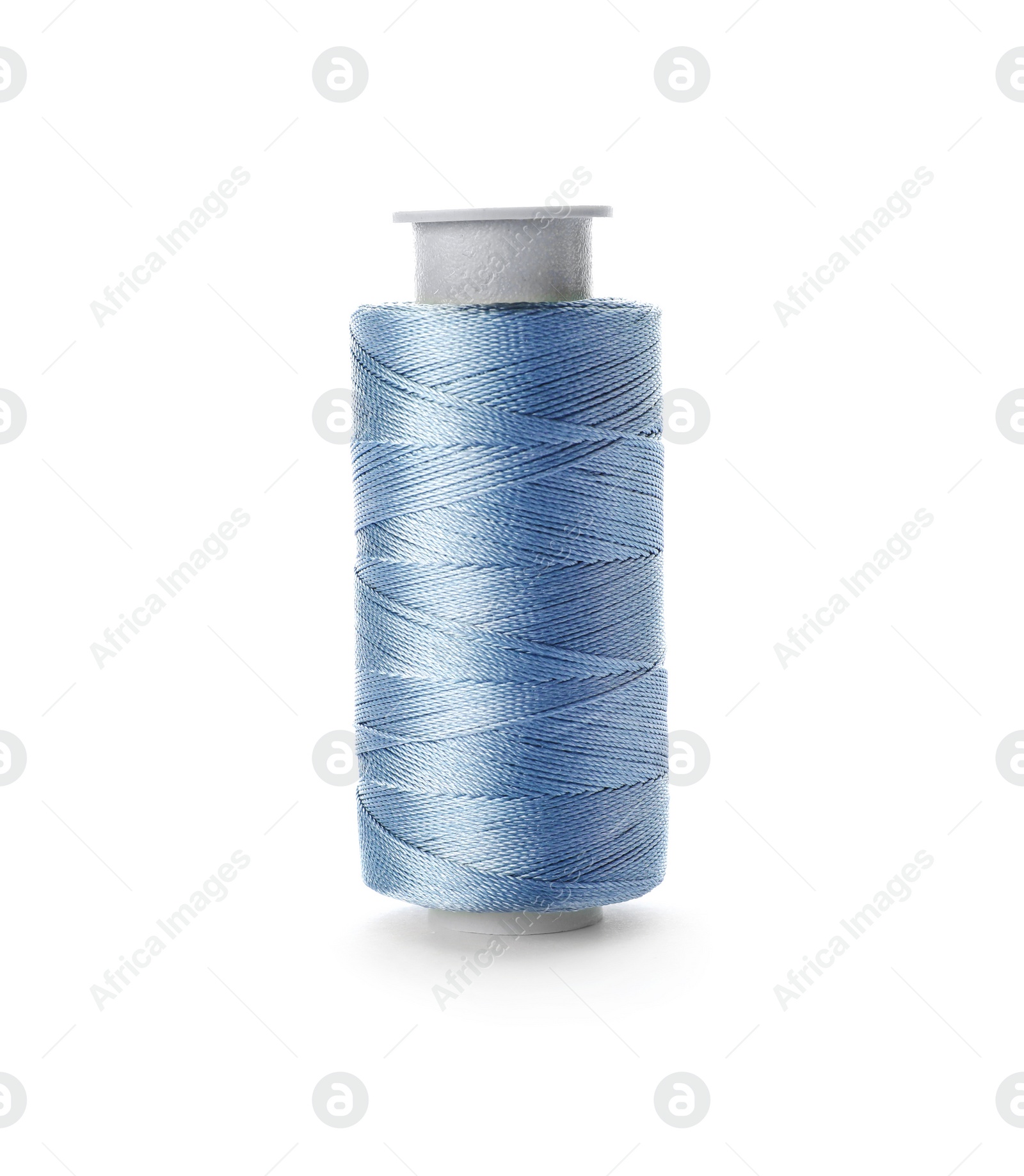 Photo of Color sewing thread on white background