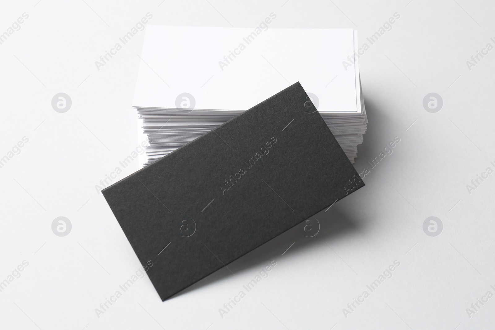 Photo of Blank business cards on white background. Mockup for design