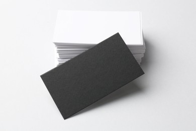 Photo of Blank business cards on white background. Mockup for design