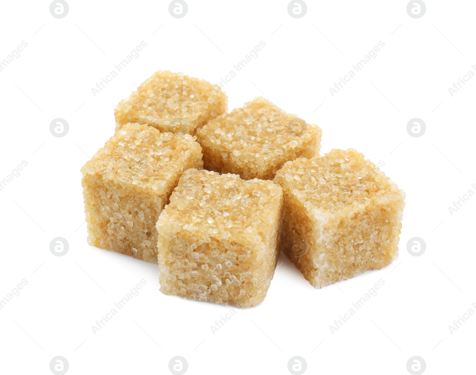 Photo of Many brown sugar cubes isolated on white