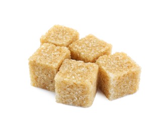 Photo of Many brown sugar cubes isolated on white