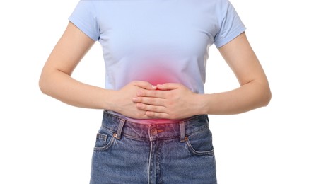 Woman suffering from stomach pain on white background, closeup