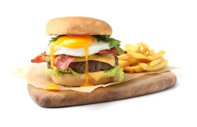 Photo of Delicious burger with fried egg and french fries isolated on white