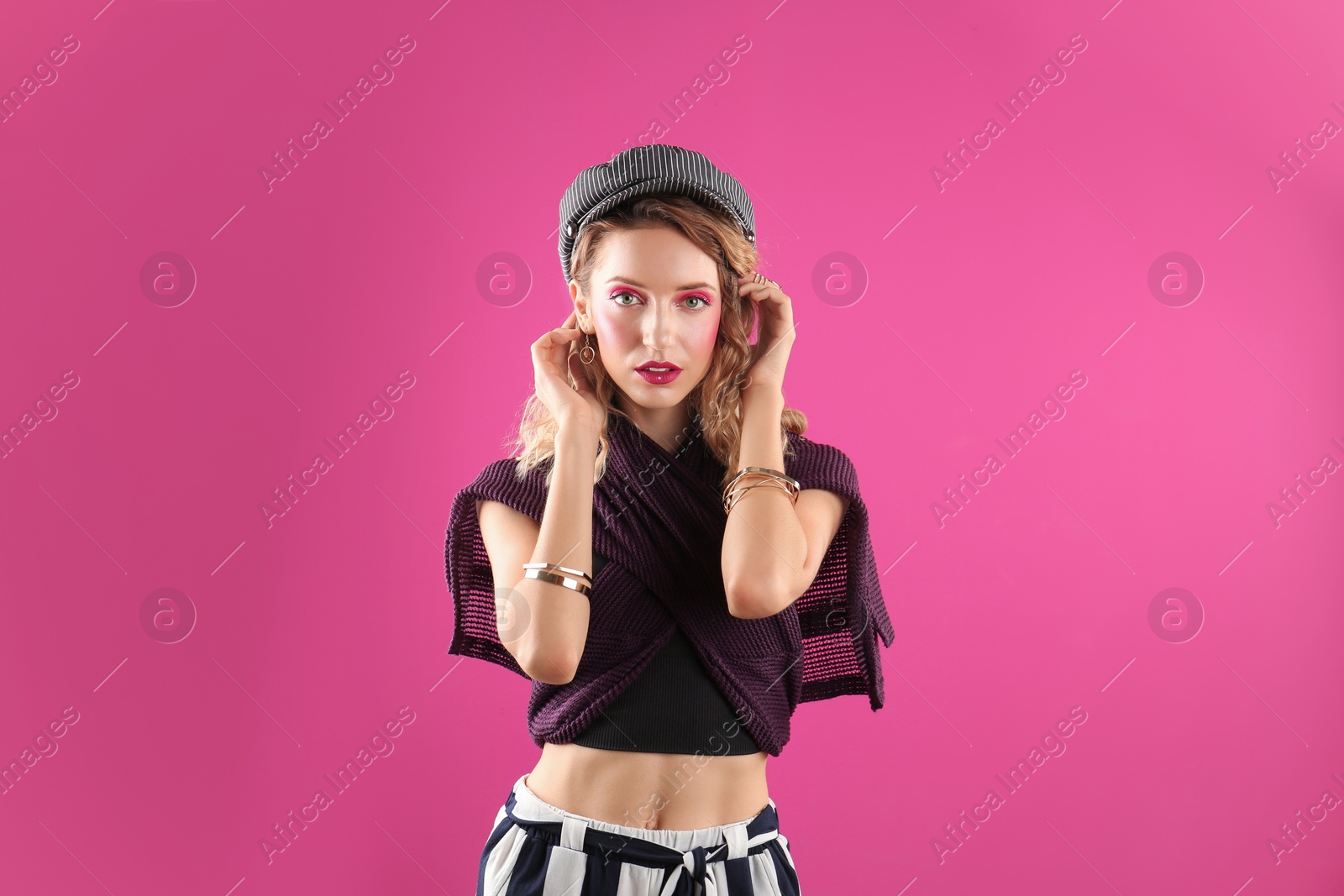 Photo of Beautiful young woman posing on color background. Summer fashion