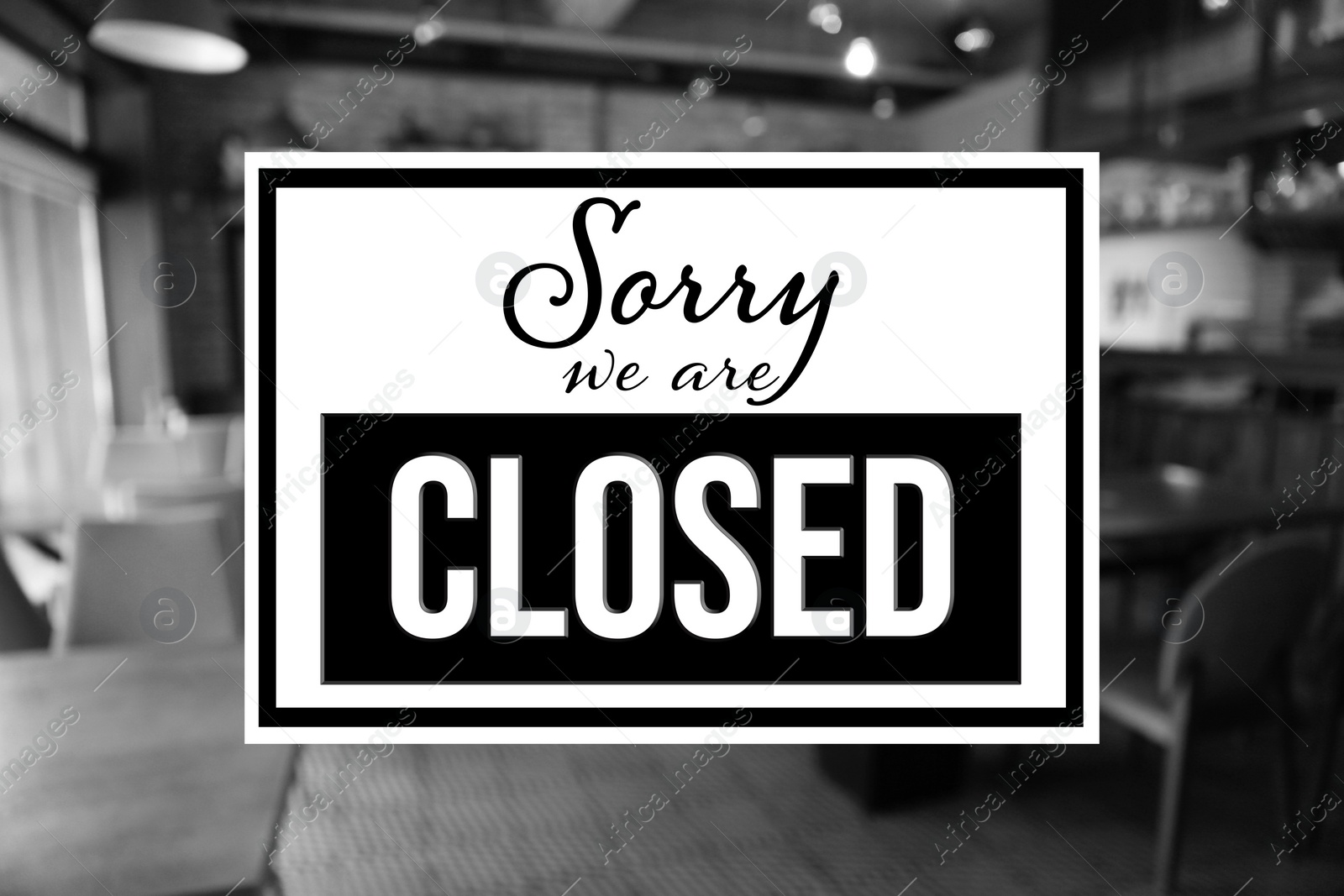 Image of Sorry we are closed sign against blurred background