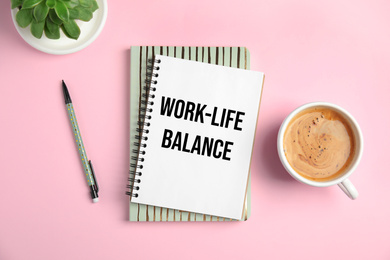 Image of Work-life balance concept. Flat lay composition with notebooks and coffee on pink background