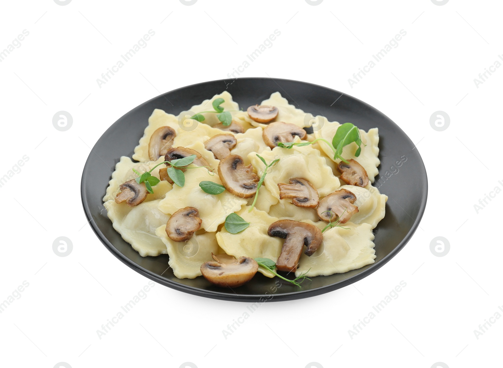 Photo of Plate of delicious ravioli with mushrooms isolated on white