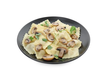 Photo of Plate of delicious ravioli with mushrooms isolated on white