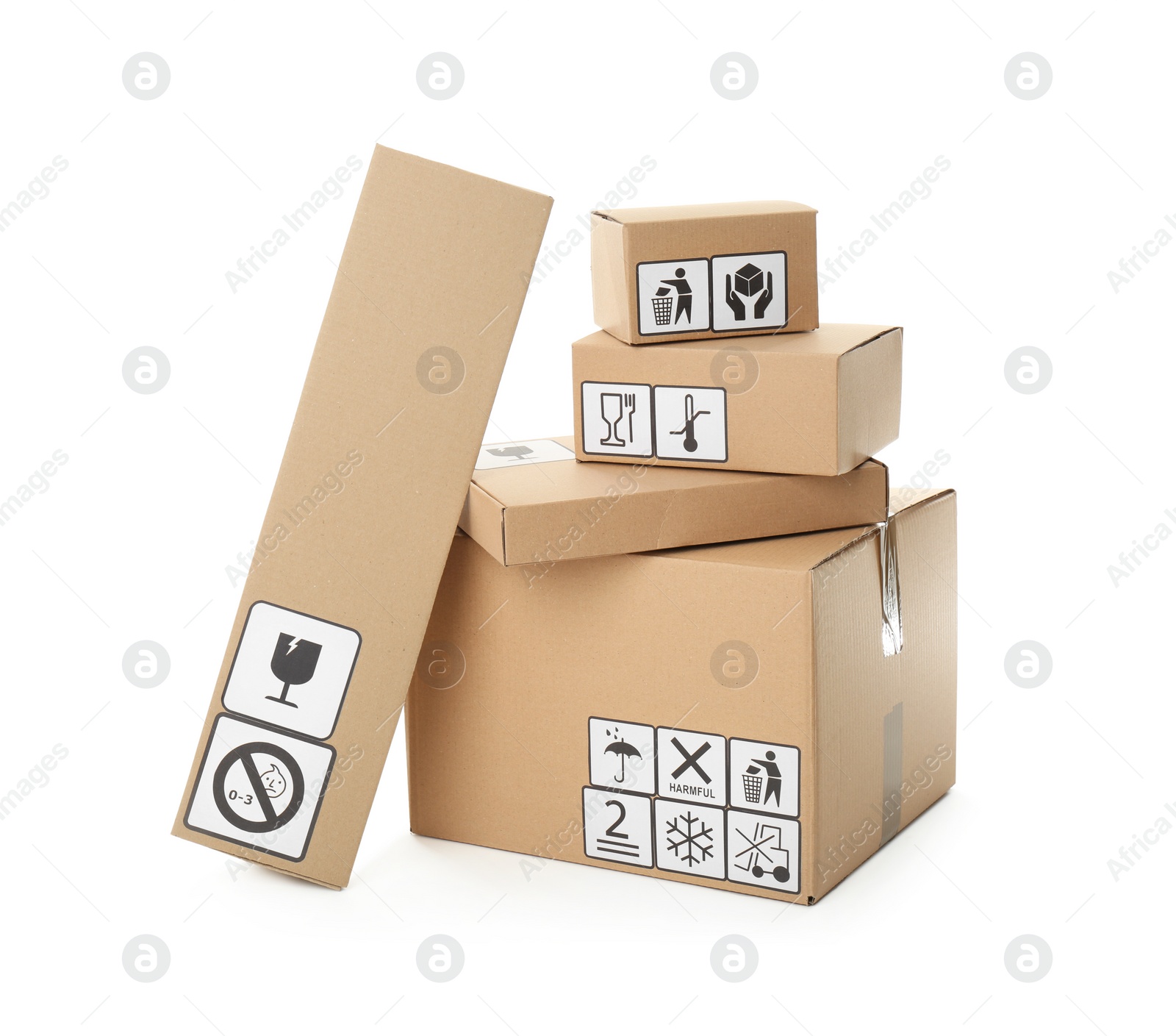 Photo of Cardboard boxes with different packaging symbols on white background. Parcel delivery