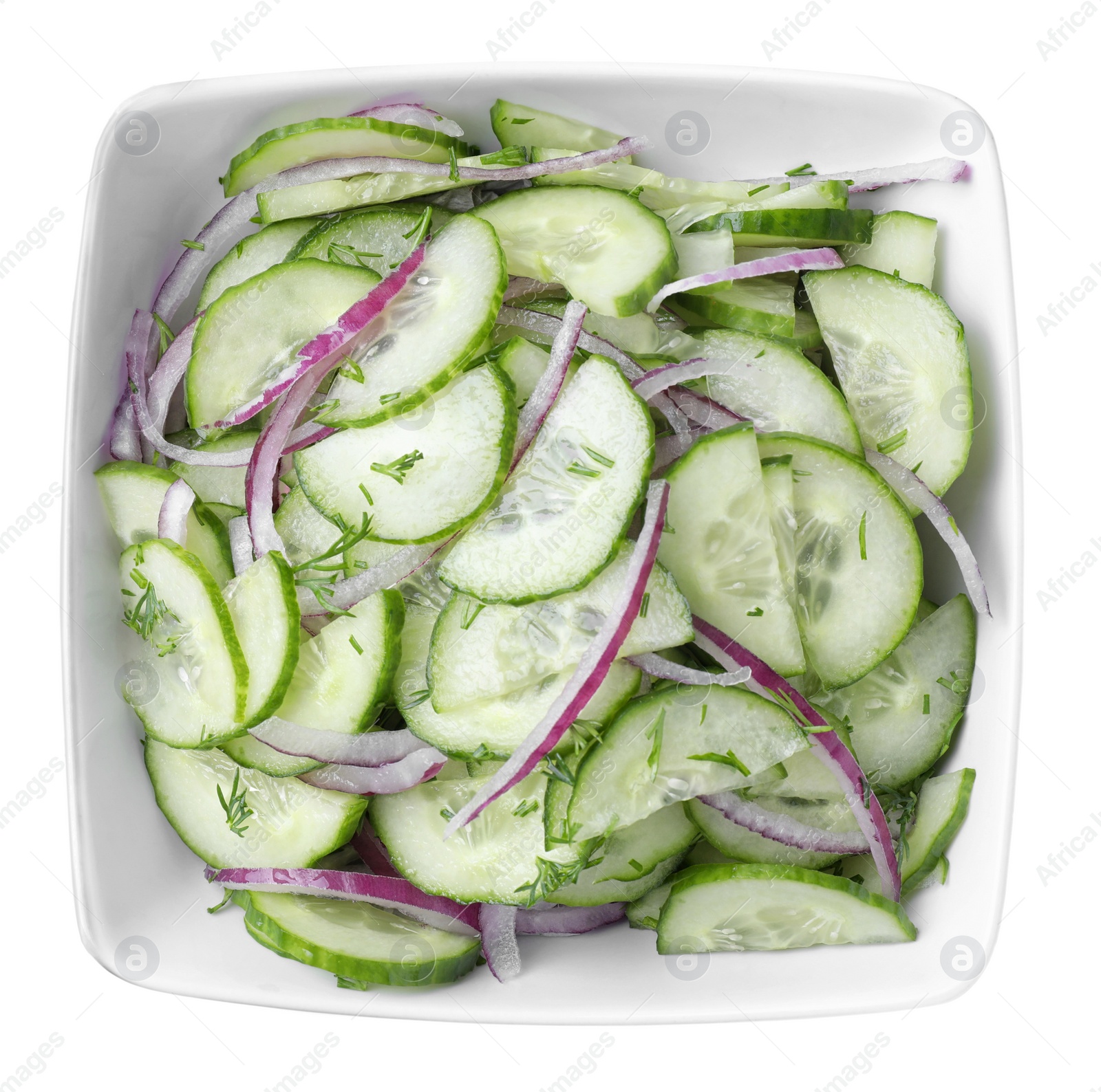 Photo of Fresh tasty salad with cucumber in bowl on white background, top view