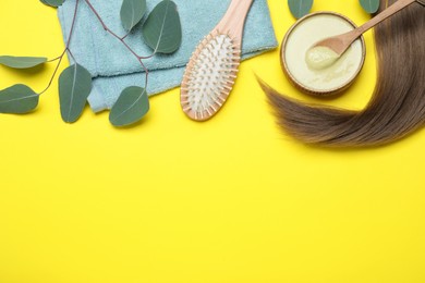 Photo of Flat lay composition with homemade hair mask and ingredients on yellow background. Space for text