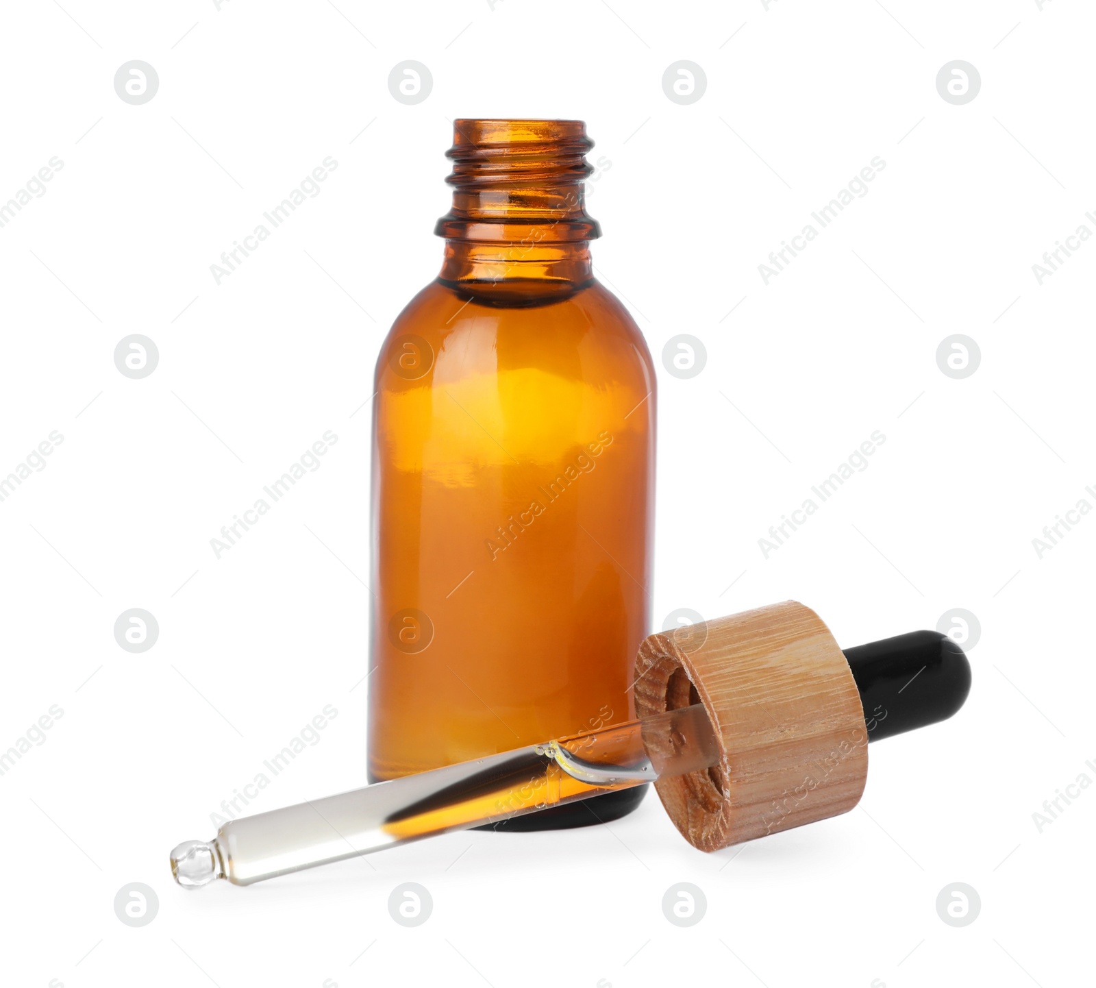 Photo of Bottle of essential oil and dropper isolated on white