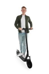 Happy man riding modern electric kick scooter on white background