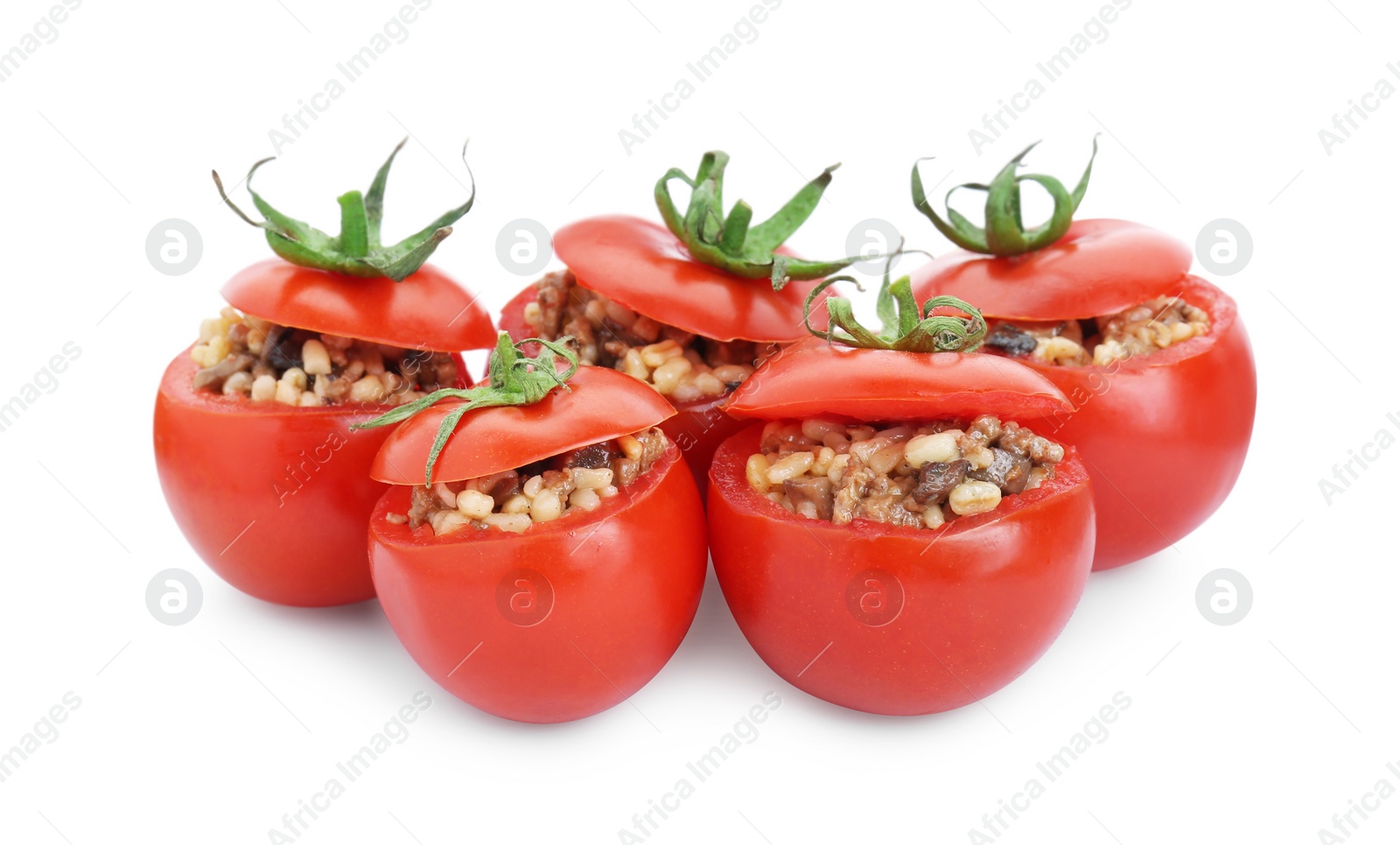 Photo of Delicious stuffed tomatoes with minced beef, bulgur and mushrooms isolated on white