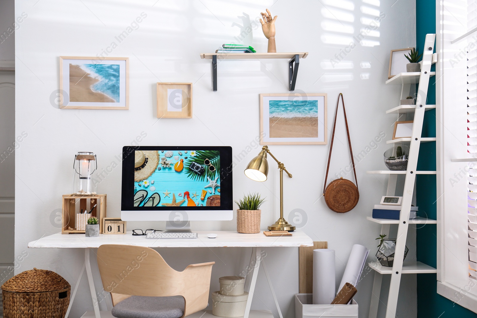 Photo of Home workplace with modern computer and desk in room