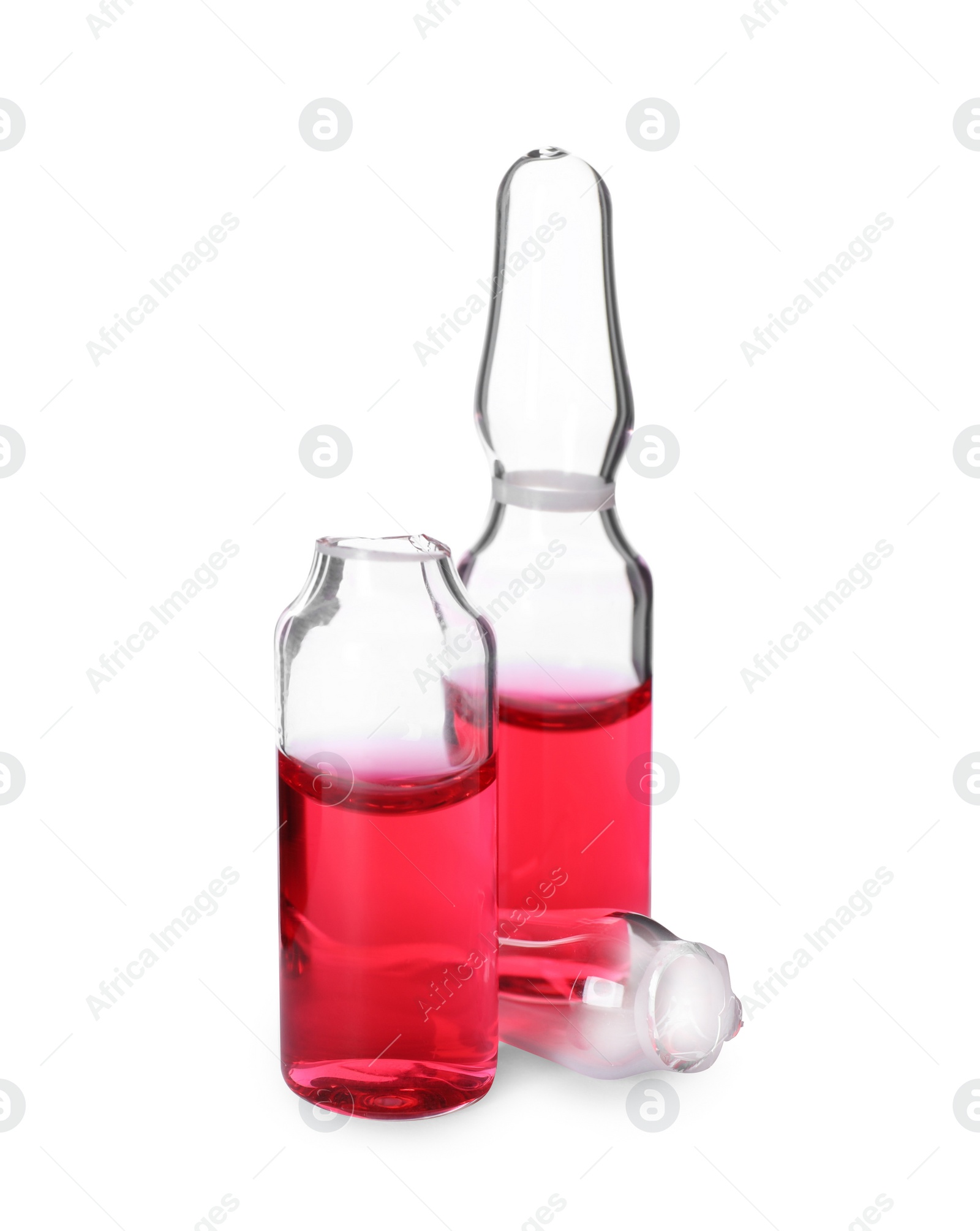 Photo of Open and closed glass ampoules with pharmaceutical product on white background