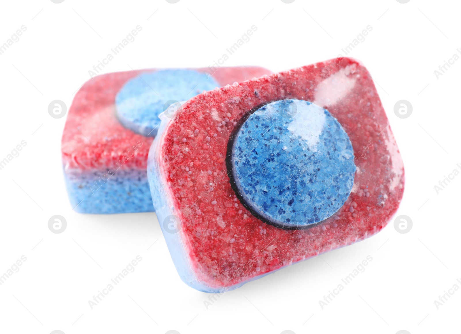 Photo of Two dishwasher detergent tablets on white background