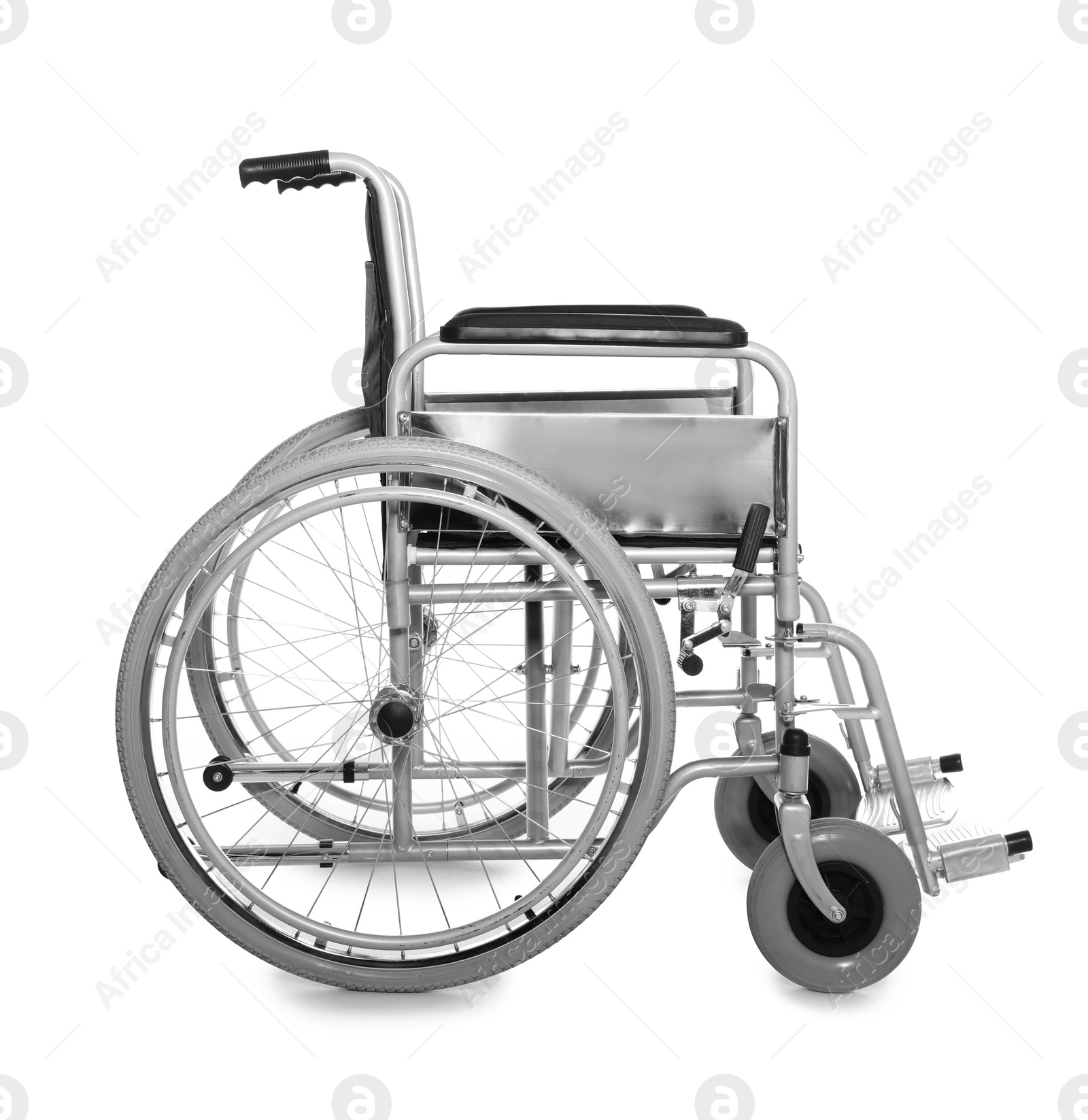 Photo of New modern empty wheelchair on white background