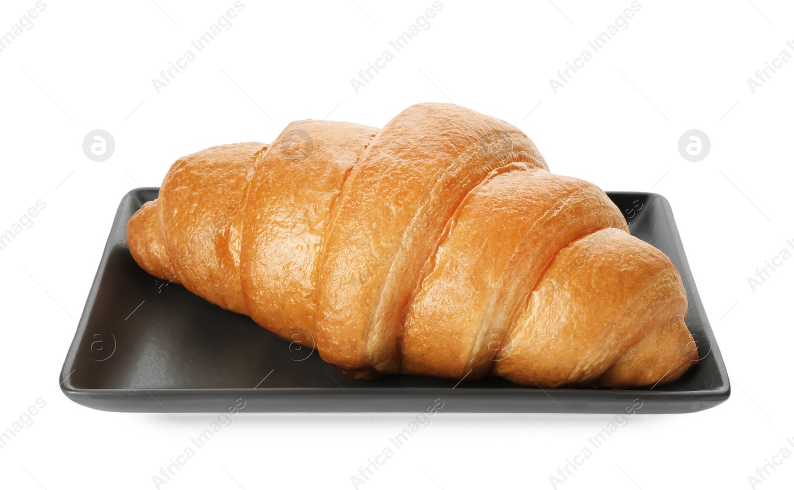 Photo of Plate with delicious fresh croissant isolated on white