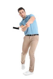 Photo of Full length portrait of man with golf club isolated on white