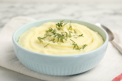 Freshly cooked homemade mashed potatoes on white table, closeup