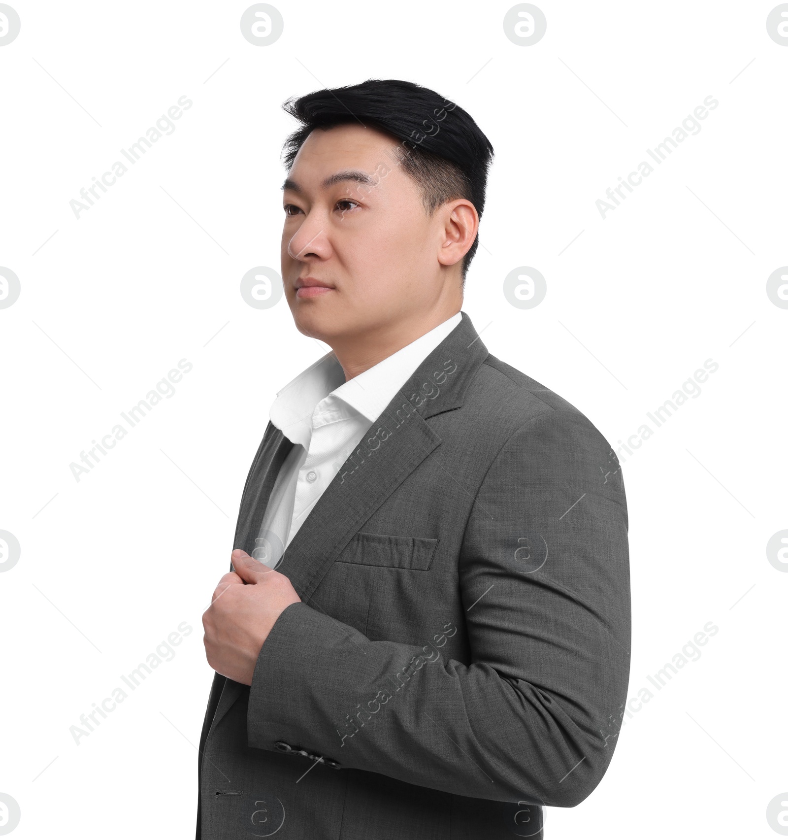 Photo of Businessman in suit posing on white background