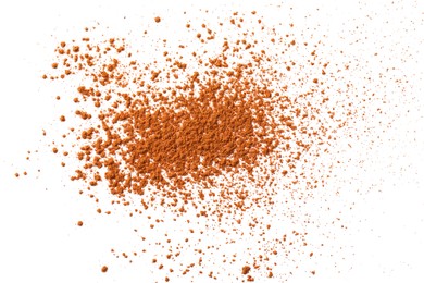 Dry aromatic cinnamon powder isolated on white, top view