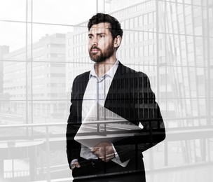 Image of Double exposure of businessman and cityscape with office building