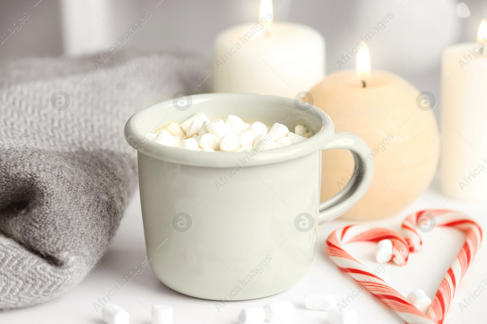 Photo of Composition with cup of hot winter drink on table. Cozy season