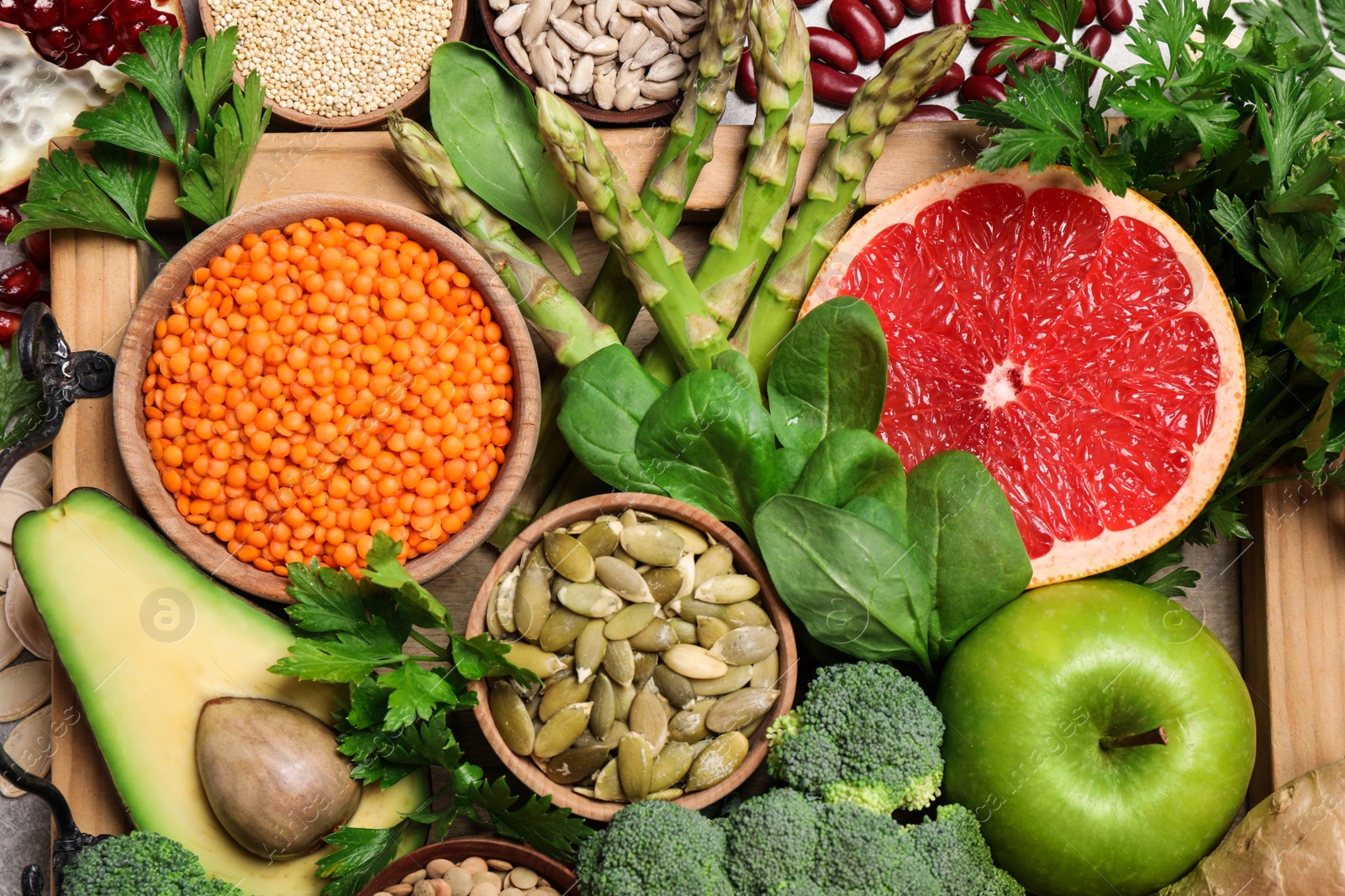 Photo of Fresh vegetables, fruits and seeds on table, flat lay