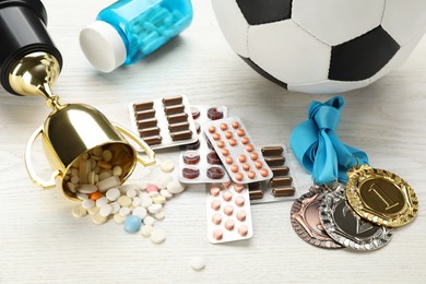 Photo of Composition with drugs on white wooden table. Doping control