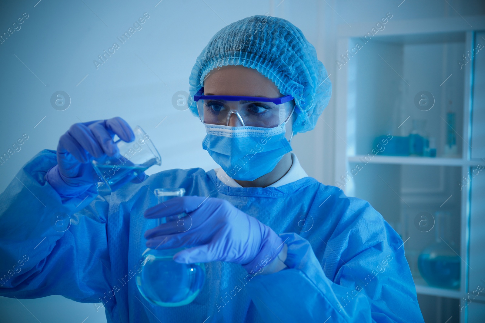 Photo of Scientist working with sample in laboratory. Medical research