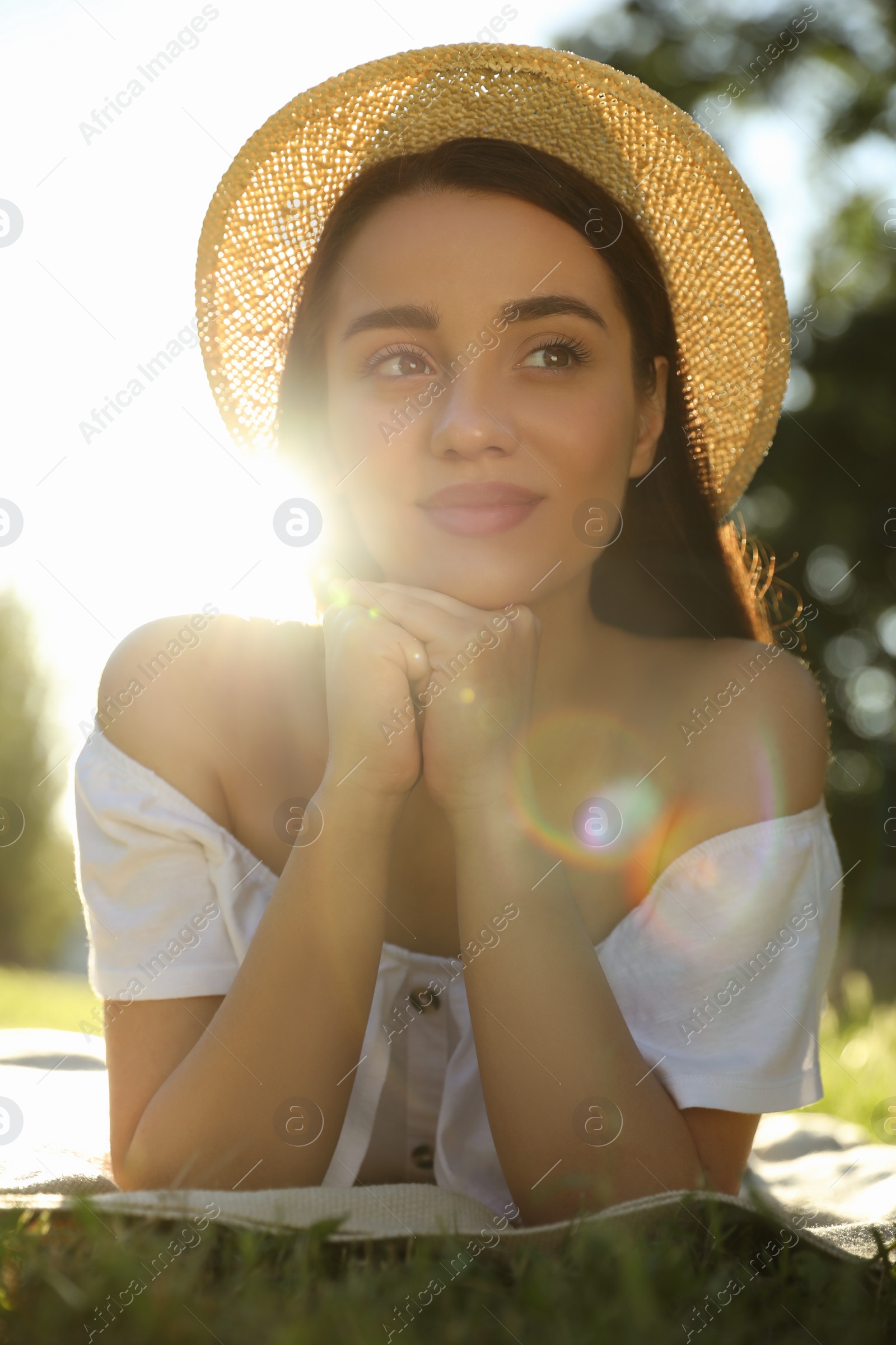 Photo of Beautiful young woman in park on sunny day