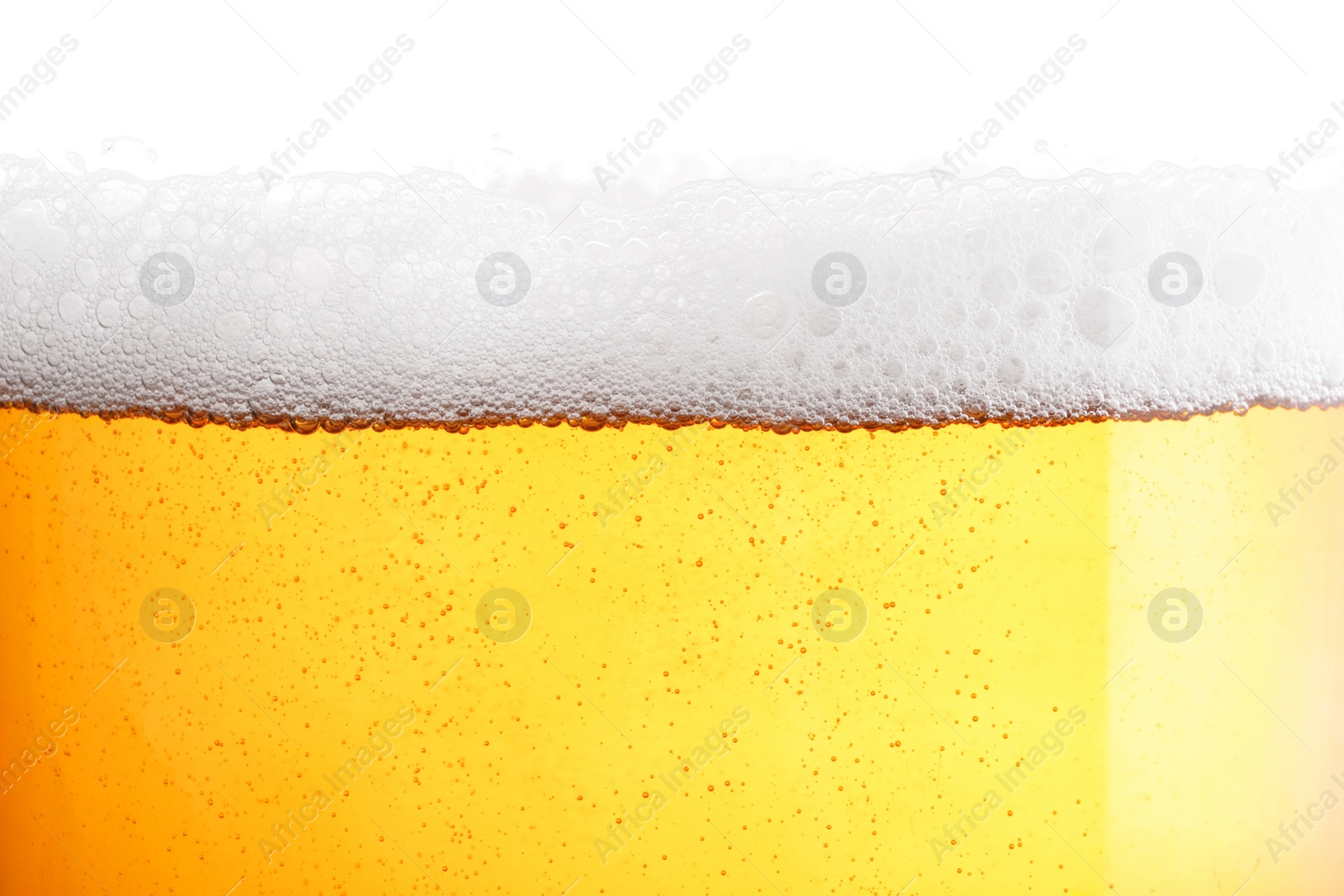 Photo of Tasty beer with foam in glass, closeup