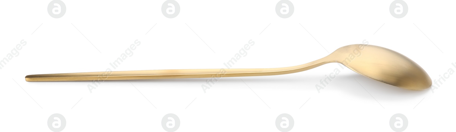 Photo of One shiny golden spoon isolated on white