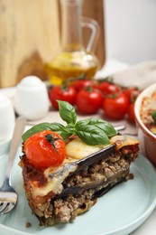 Photo of Plate of delicious eggplant lasagna on table