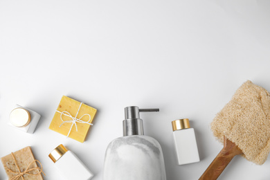 Flat lay composition with marble soap dispenser on white background. Space for text