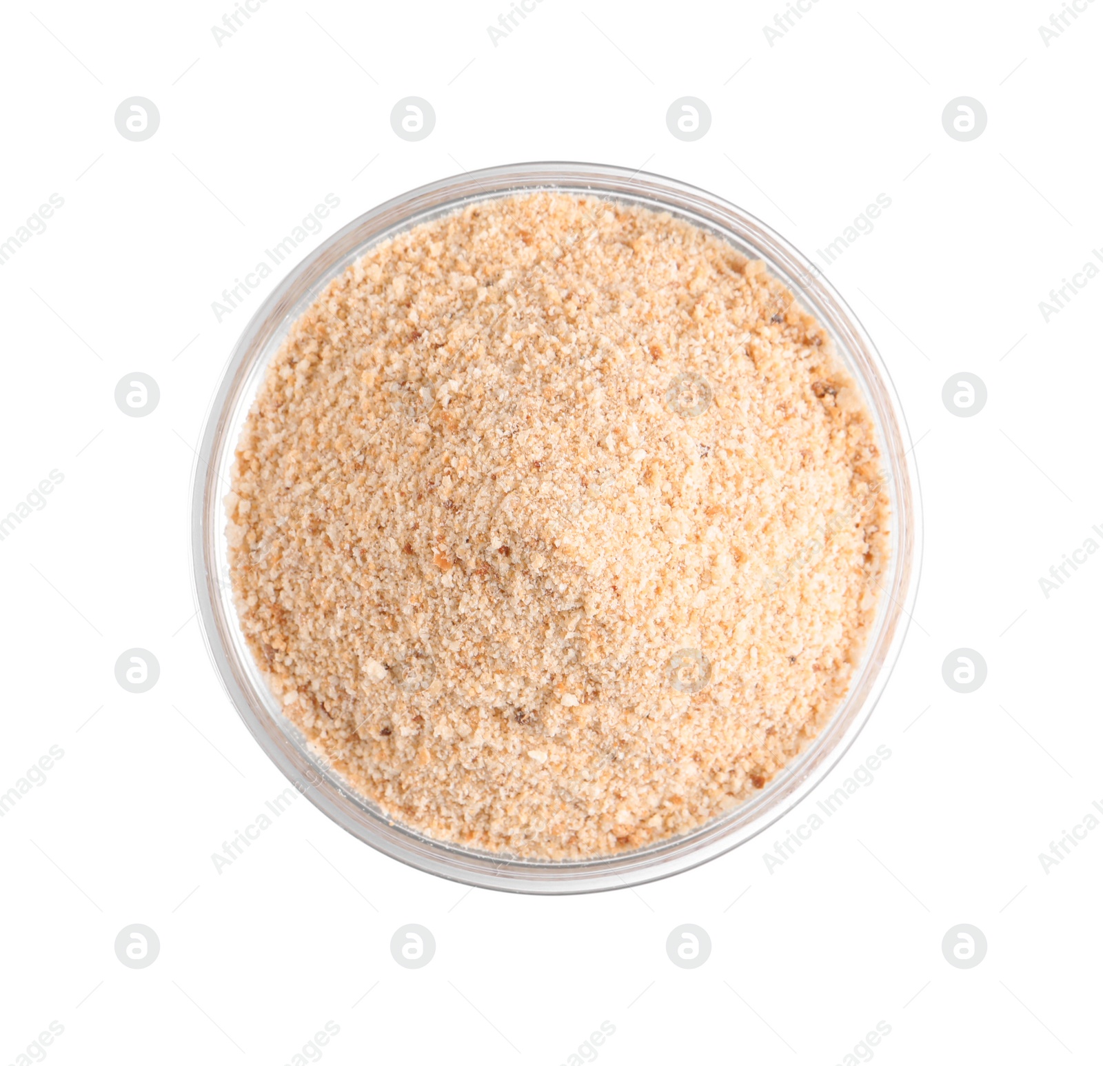 Photo of Fresh bread crumbs in glass bowl isolated on white, top view