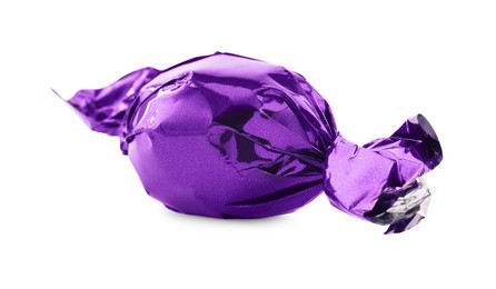 Photo of Candy in purple wrapper isolated on white