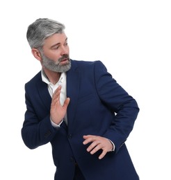 Photo of Mature businessman in stylish clothes posing on white background